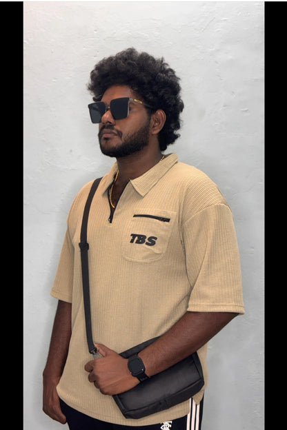 Side view of biscuit color Korean down shoulder oversized polo t-shirt for men showing relaxed fit sleeve detail in sizes 3XL to 7XL by TheBrandSpot