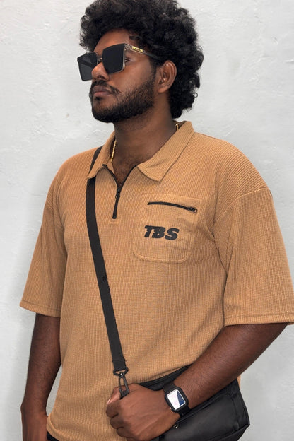 Side view of light biscuit color Korean down shoulder oversized polo t-shirt for men showing relaxed fit sleeve detail in sizes 3XL to 7XL by TheBrandSpot