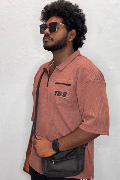 Side view of rusty pink Korean down shoulder oversized polo t-shirt for men showing relaxed fit sleeve detail in sizes 3XL to 7XL by TheBrandSpot