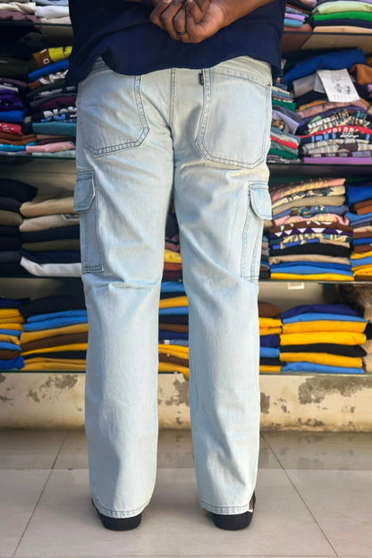 Back view of men's ice blue 6 pocket cargo jeans showing functional back pockets and side cargo flaps in sizes 38 and 40 by TheBrandSpot