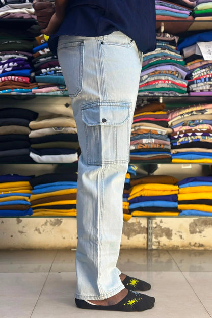 Side view of men's ice blue 6 pocket cargo jeans showing spacious side utility flap pocket in sizes 38 and 40 by TheBrandSpot
