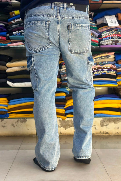 Back view of men's light blue 6 pocket cargo jeans showing functional back pockets and side cargo flaps in sizes 38 and 40 by TheBrandSpot