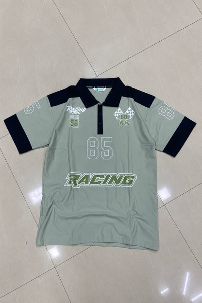 Men's graphic printed fake cotton polo t-shirt in calm sage green and black with racing 85 print by The Brand Spot