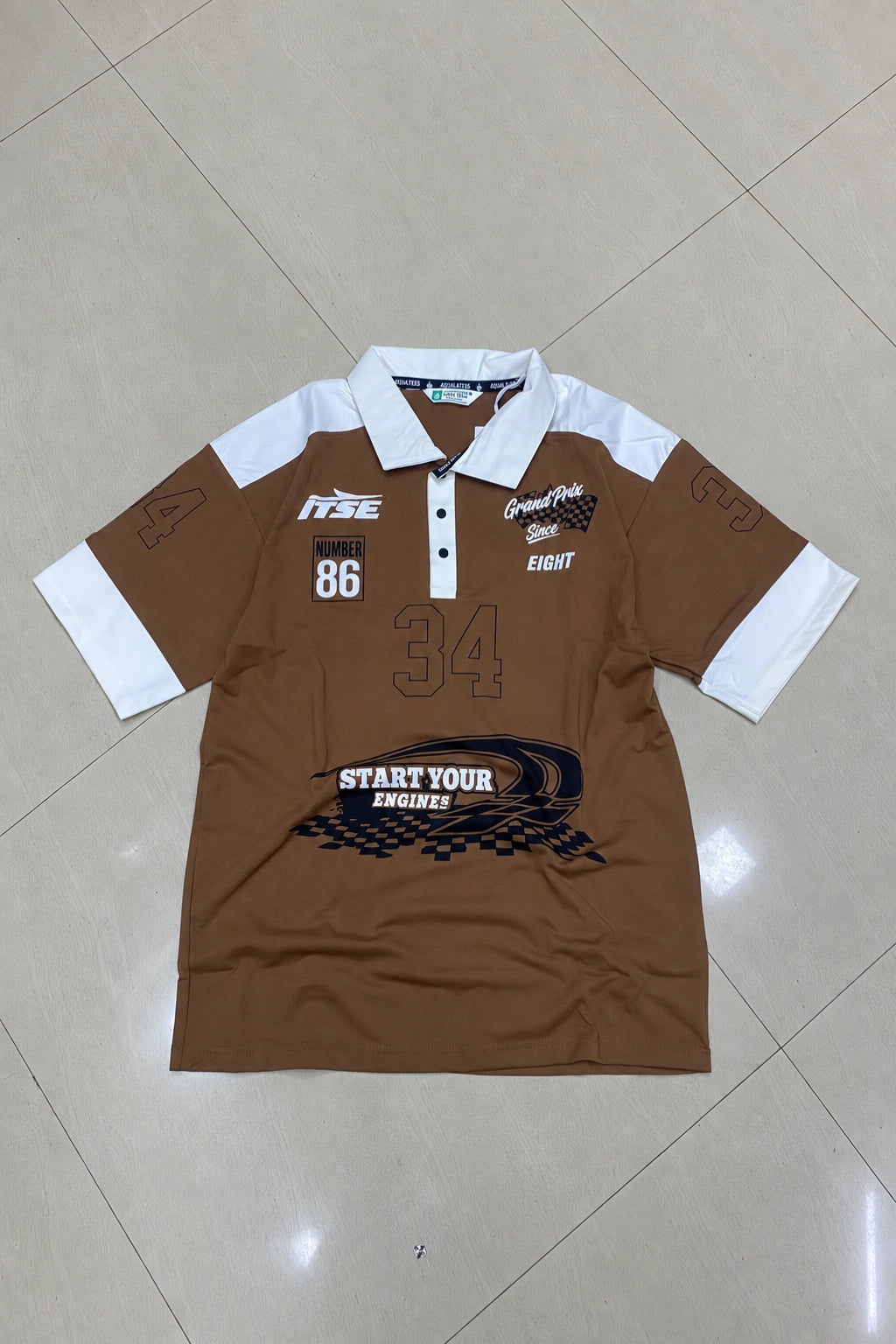 Men's graphic printed fake cotton polo t-shirt in cocoa taupe brown and white with racing print by The Brand Spot
