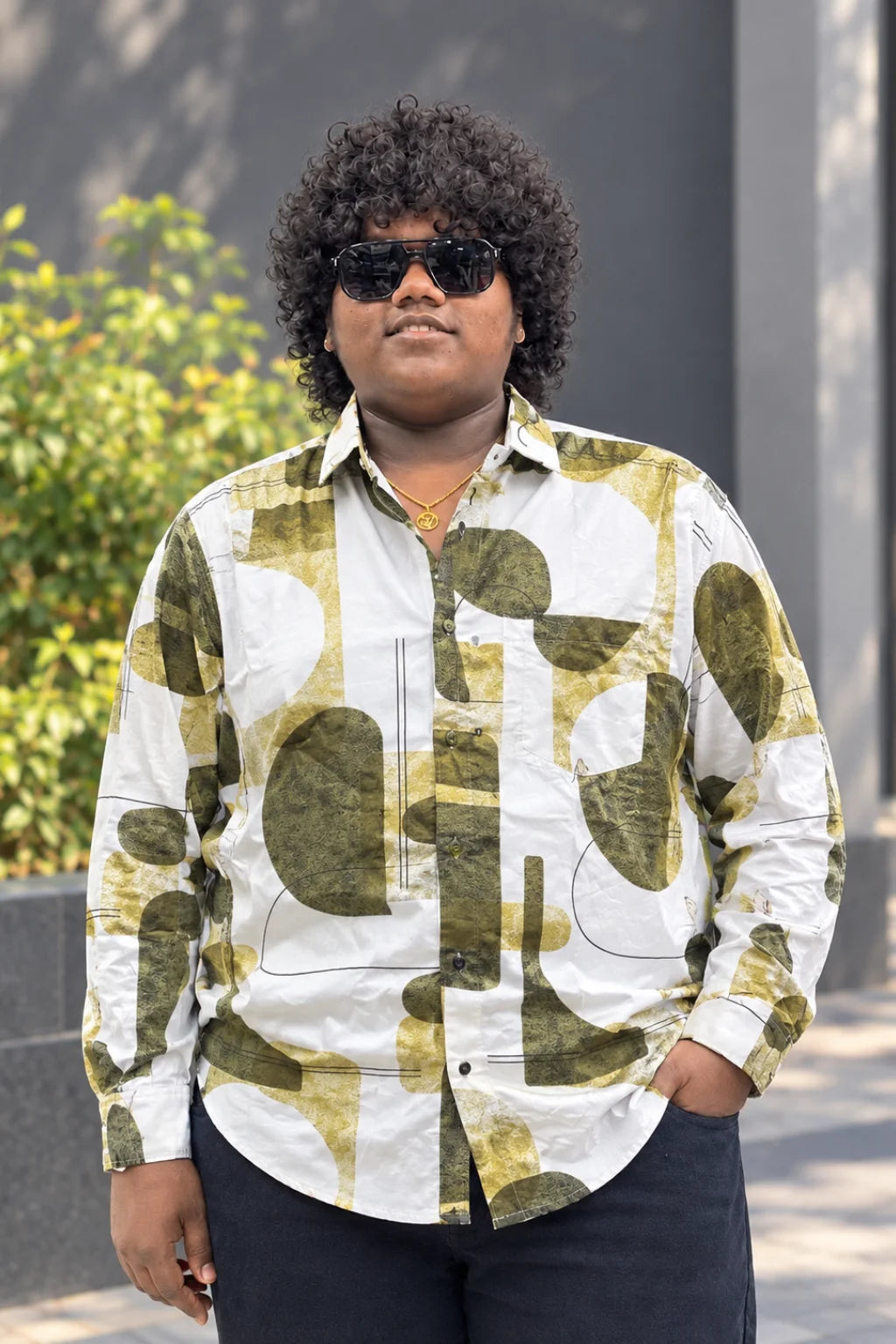 Men's magic printed casual shirt in Military Olive color variant worn by model by The Brand Spot