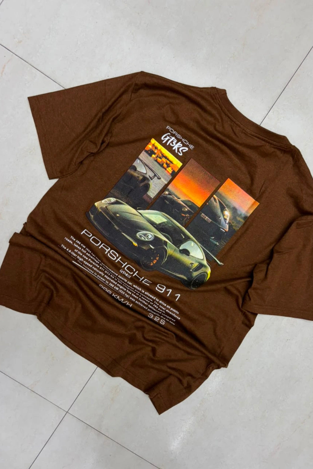 Back view of men's mahogany brown plus size t-shirt featuring Porsche 911 GT3RS sports car sunset graphic artwork print in sizes 3XL to 6XL by TheBrandSpot