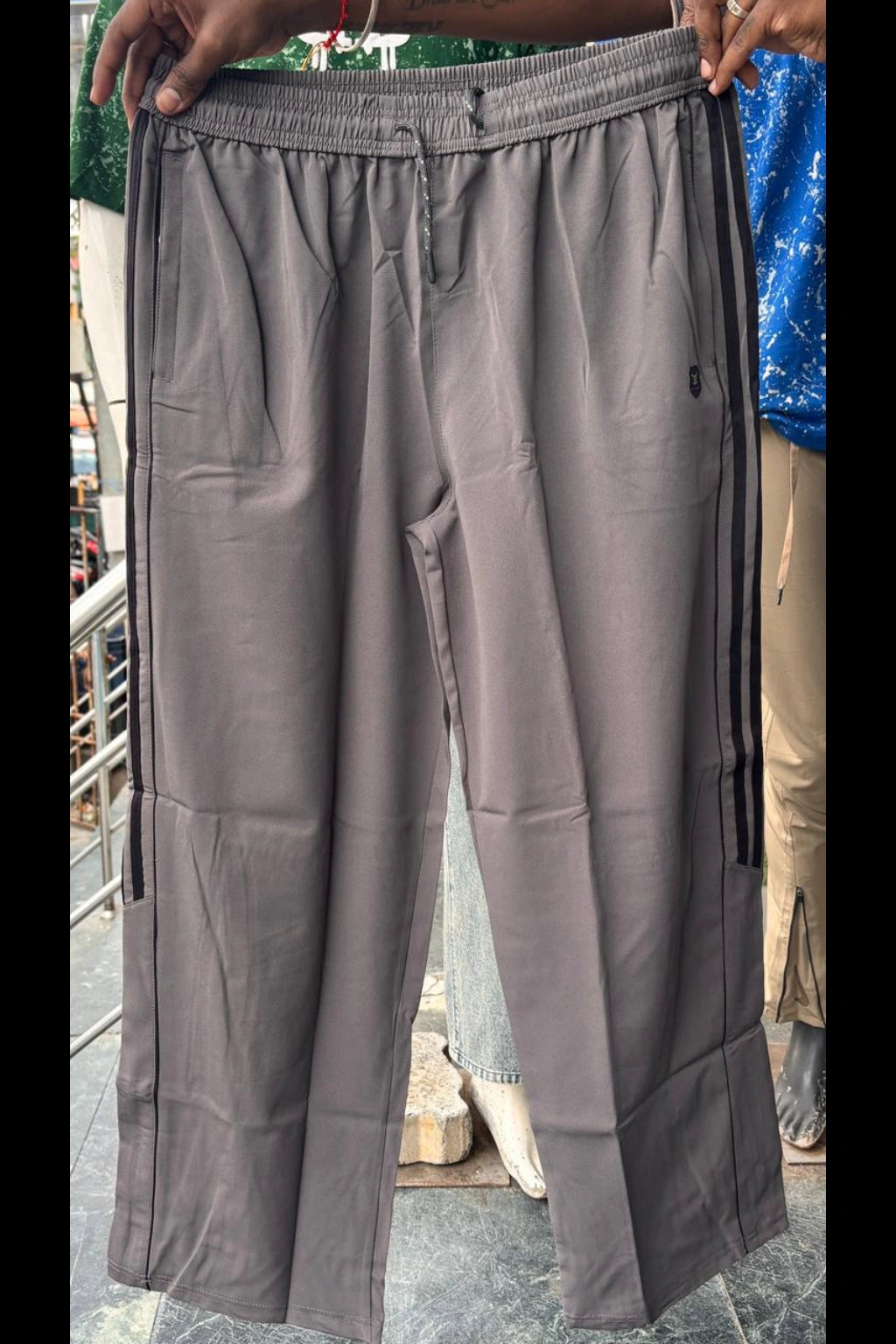 Men's olive green plus size baggy terry track pants with elastic waistband and side pockets in sizes 3XL to 7XL by TheBrandSpot