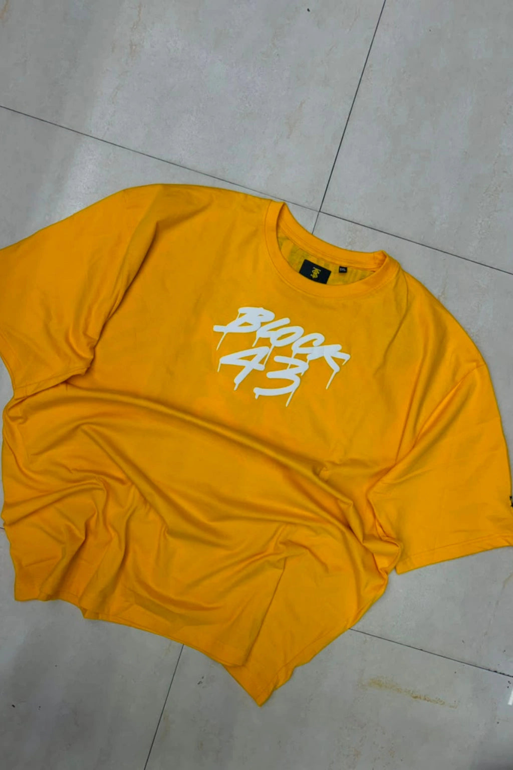 Front view of men's rustic gold plus size t-shirt with BLOCK 43 chest graphic logo in sizes 3XL to 8XL by TheBrandSpot