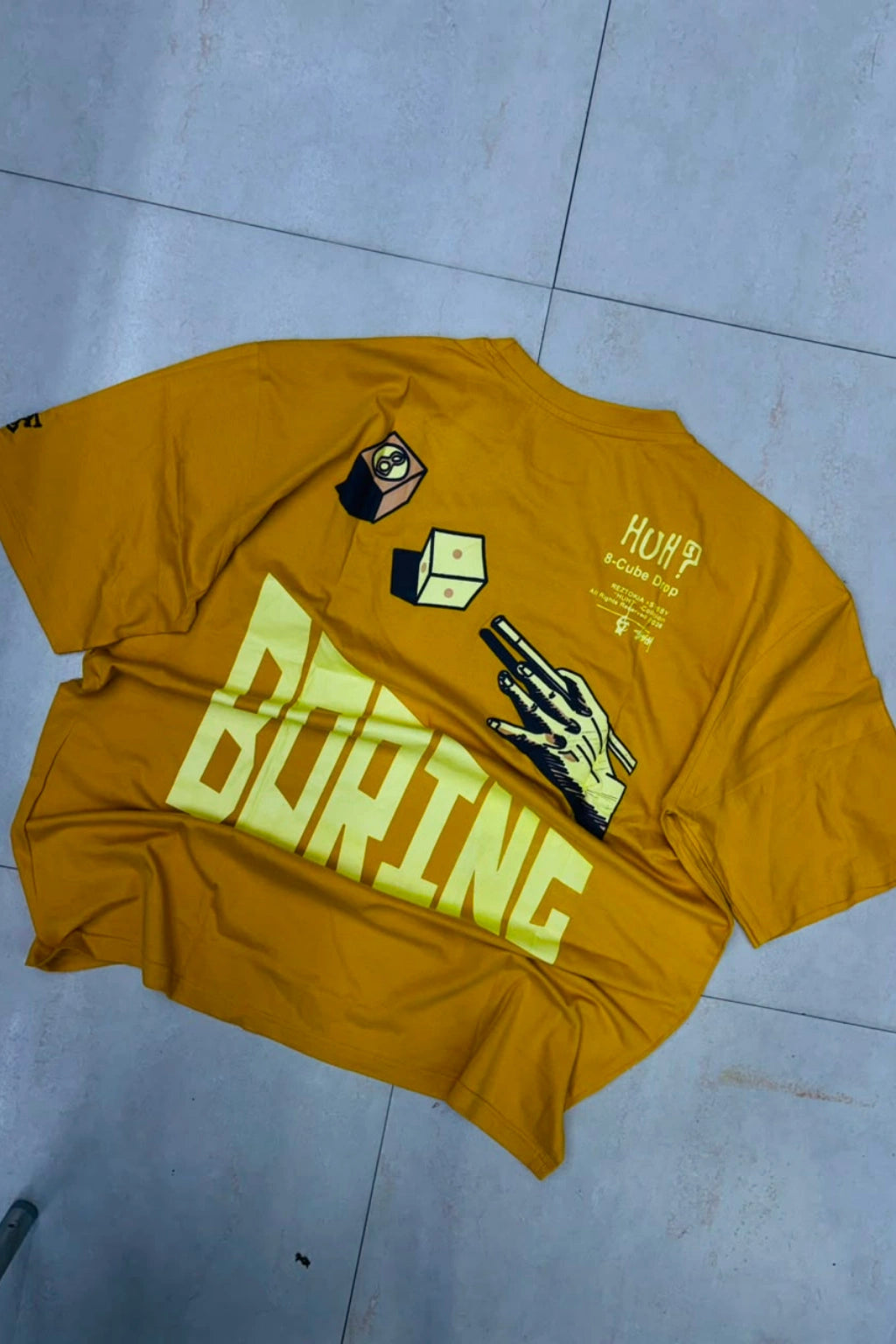Back view of men's yellowish brown plus size t-shirt featuring BORING graphic artwork print in sizes 3XL to 8XL by TheBrandSpot