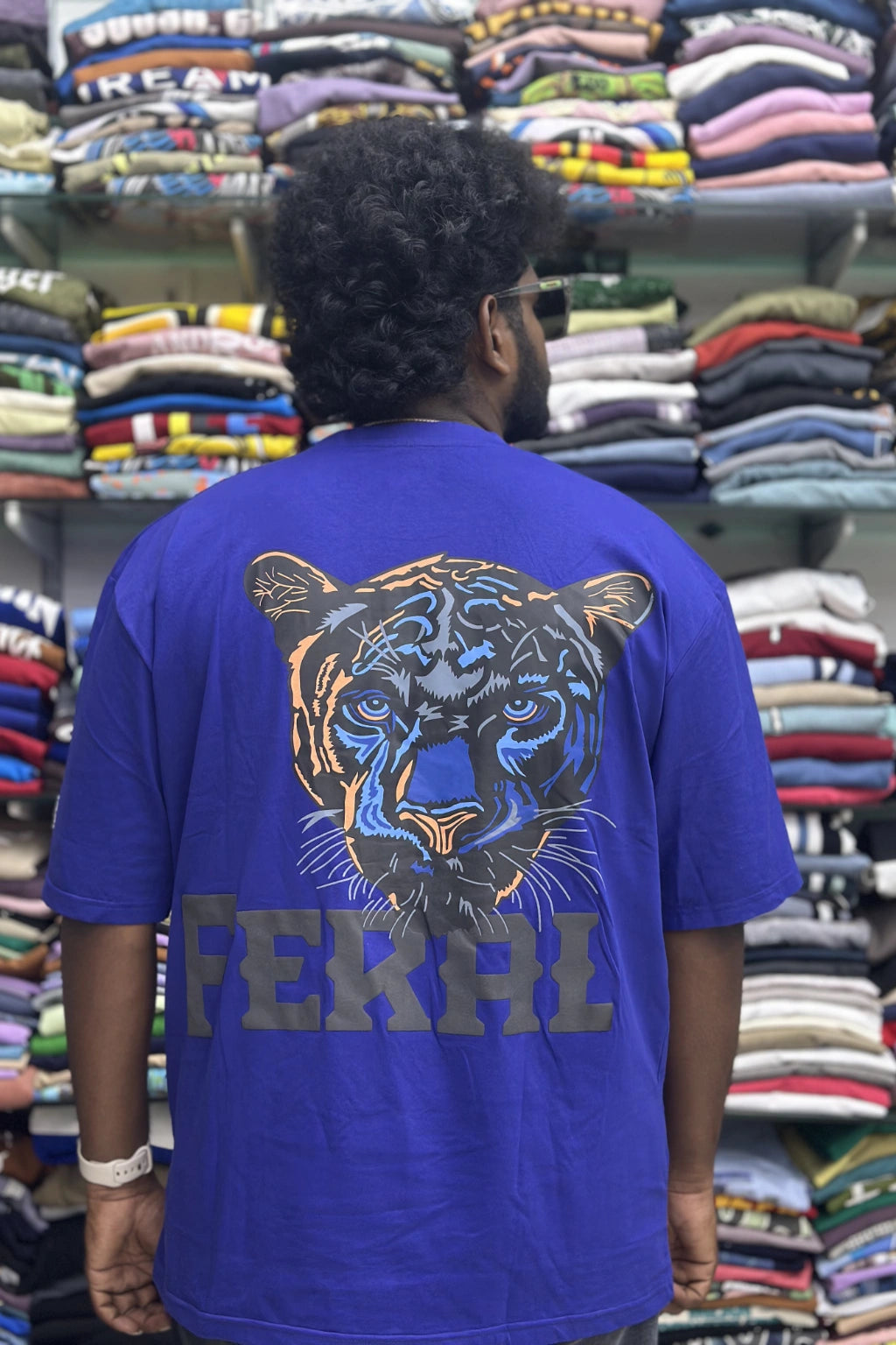 Back view of men's periwinkle blue plus size half sleeve cotton t-shirt with blue tiger graphic print in sizes 5XL to 10XL by TheBrandSpot