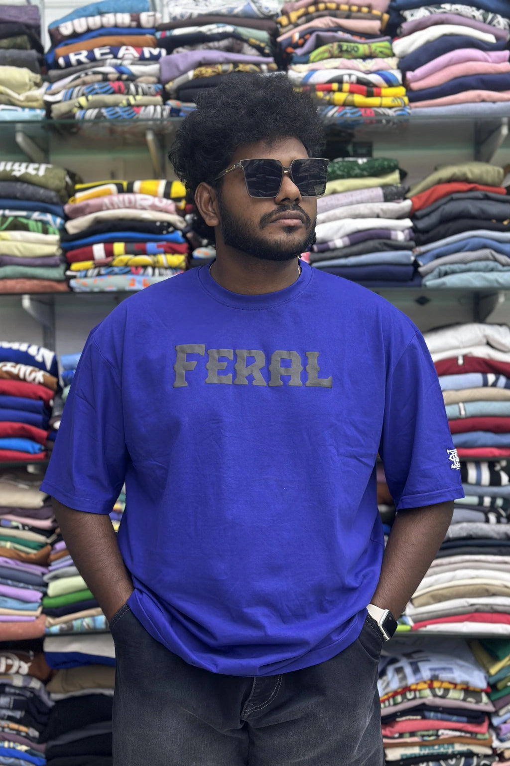 Men's periwinkle blue plus size half sleeve cotton t-shirt with FERAL front print in sizes 5XL to 10XL by TheBrandSpot