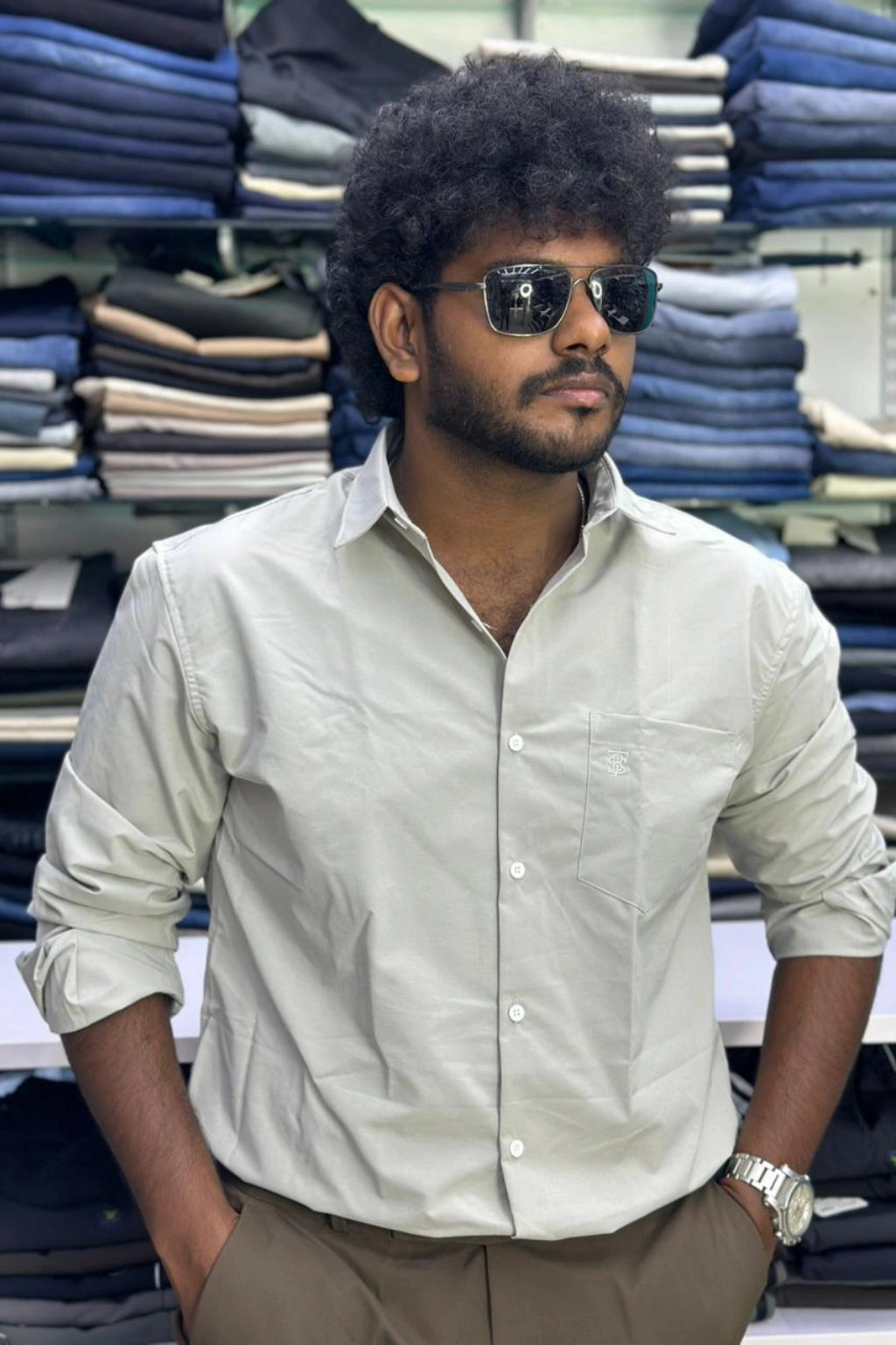 Model wearing men's ash sand plus size full sleeve Lacka fabric shirt in sizes 3XL to 7XL by TheBrandSpot