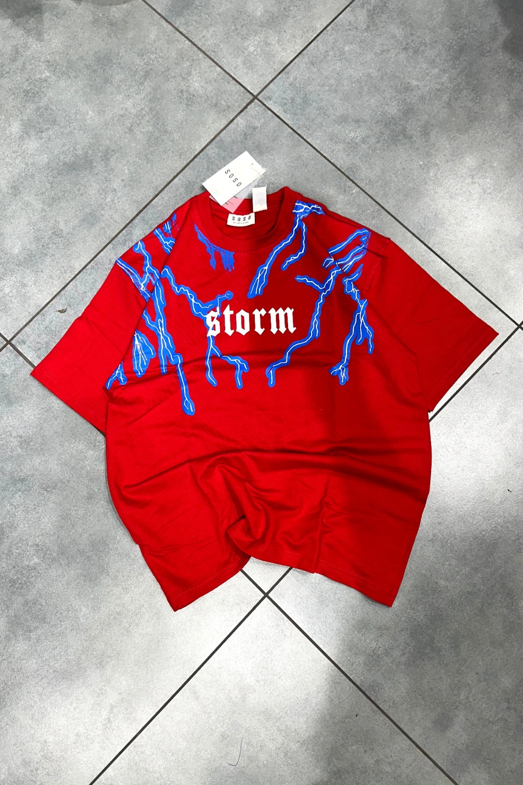 Men's crimson red storm lightning graphic printed oversized t-shirt in drop shoulder fit by The Brand Spot