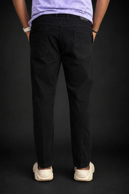 Back full view of men's Z-black premium stretch jeans in tapered fit available in sizes 28 to 48 by TheBrandSpot