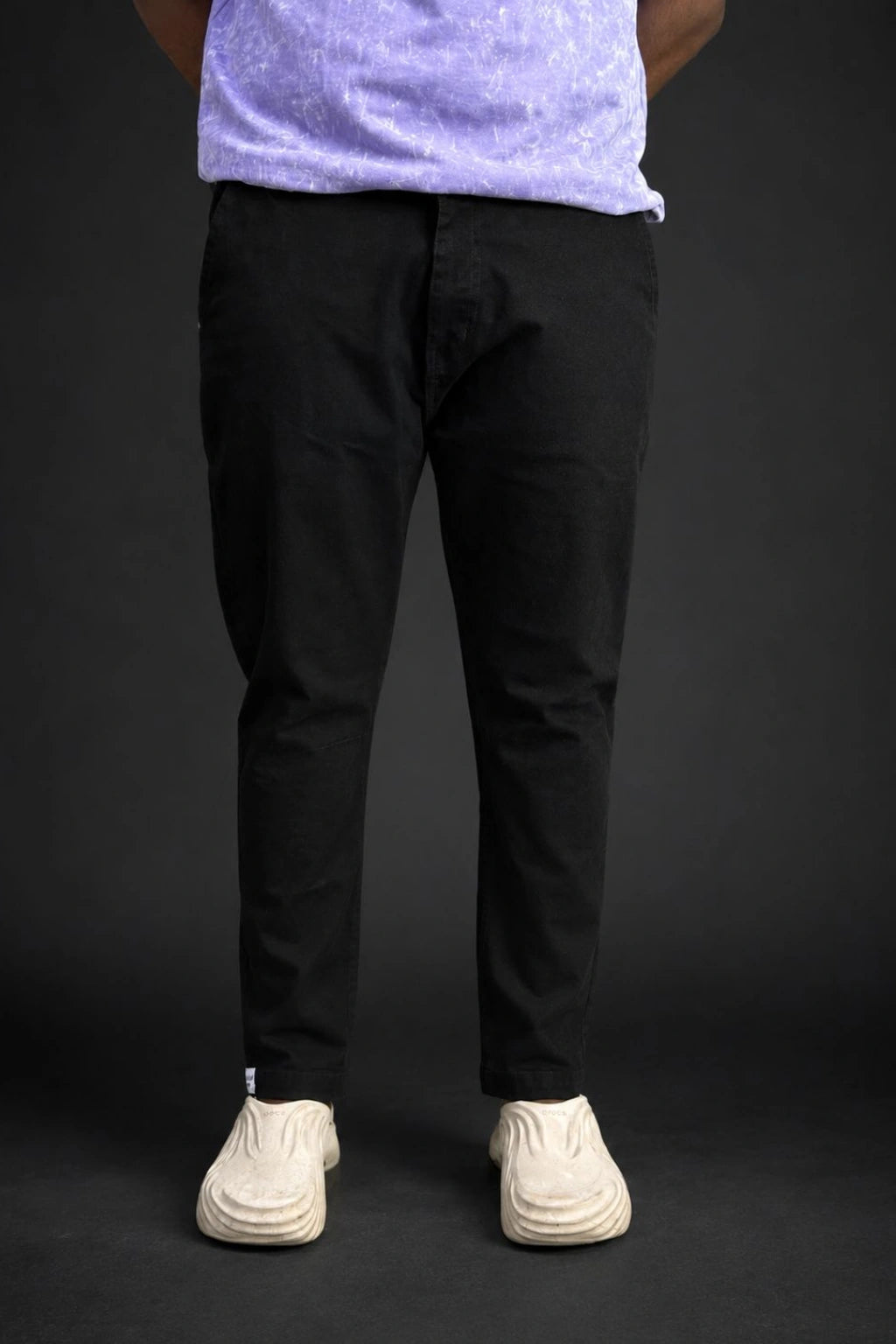 Front full view of men's Z-black premium stretch jeans in tapered fit available in sizes 28 to 48 by TheBrandSpot