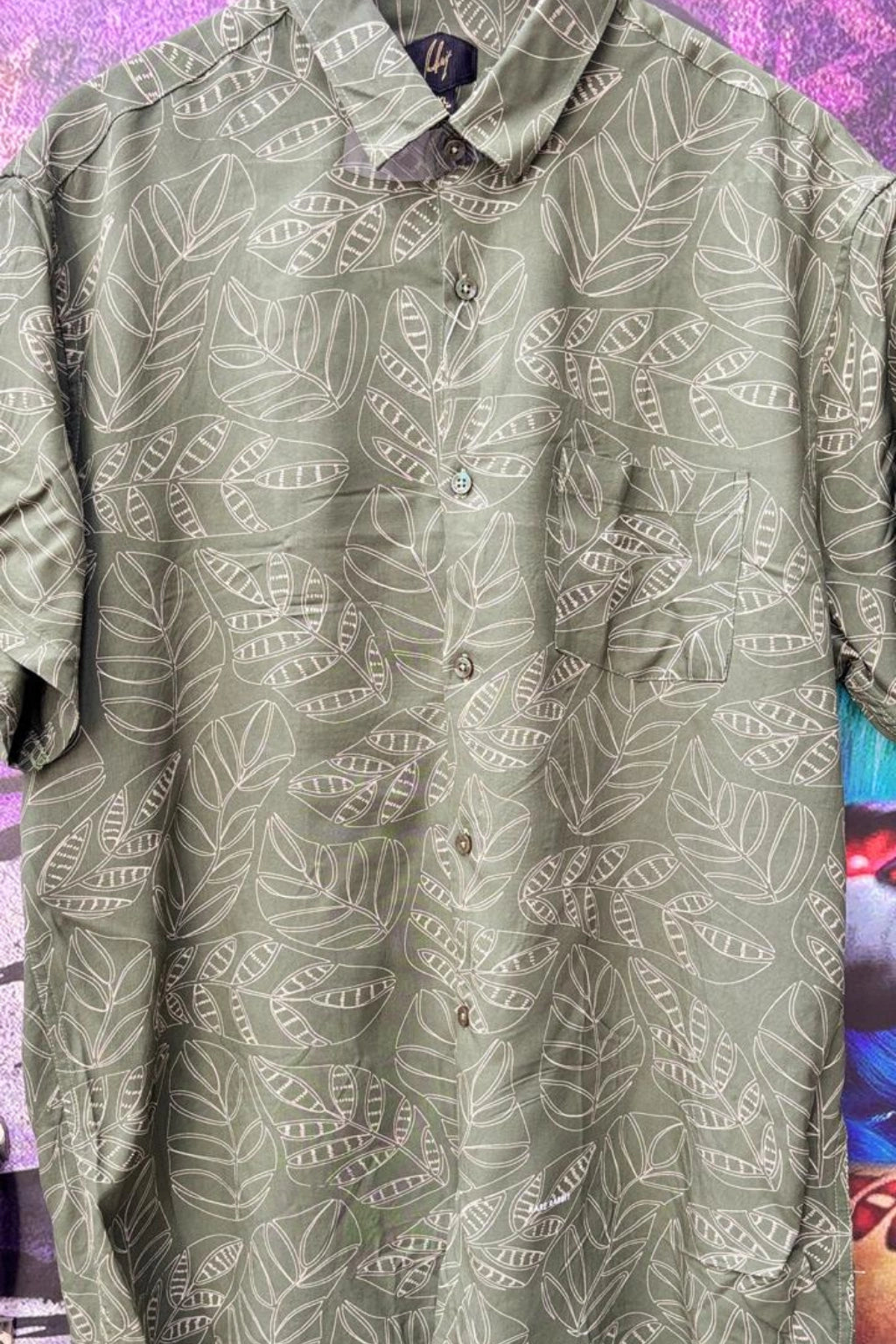 Olive Grey Plus Size Rayon Printed Half Sleeve Shirt for Men from TheBrandspot — premium rayon fabric with subtle leaf print on olive‑grey base, breathable and lightweight design for big and tall men (3XL–5XL); ideal for summer casual, holiday, and everyday wear.