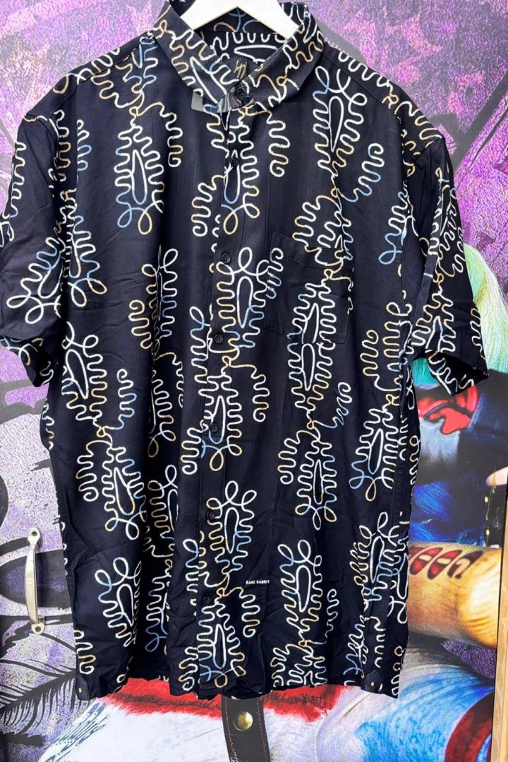Raven Black Plus Size Rayon Printed Half Sleeve Shirt for Men from TheBrandspot — premium rayon fabric with white abstract vertical pattern on deep black base, breathable and lightweight design for big and tall men (3XL–5XL); ideal for summer casual, holiday, and everyday wear.