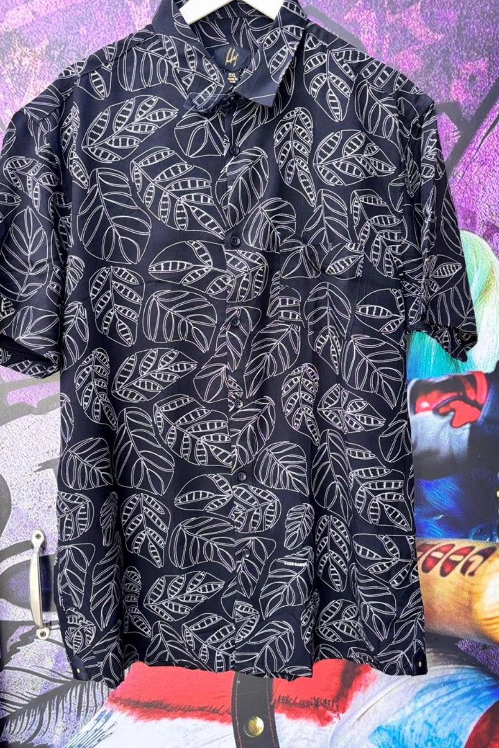 Twilight Violet Plus Size Rayon Printed Half Sleeve Shirt for Men from TheBrandspot — premium rayon fabric with white leaf print on deep violet‑black base, breathable and lightweight design for big and tall men (3XL–5XL); ideal for summer casual, holiday, and everyday wear.